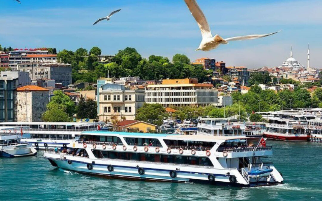 Boat on water with city skyline - Istanbul